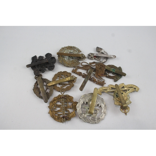 397 - Military Cap Badges x 10 inc The Welsh Hampshire Kings Own