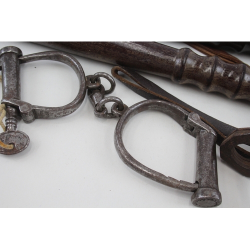 421 - Collection of Police Truncheons & Handcuffs