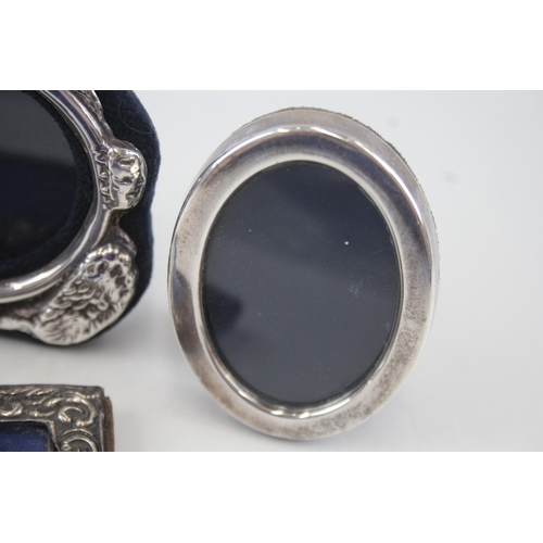 44 - 4 x .925 sterling photograph frames