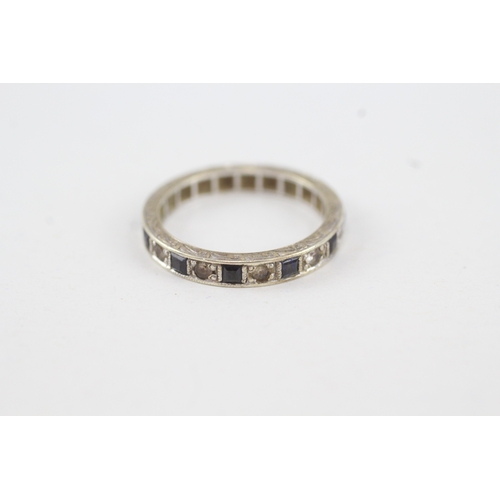 120 - 9ct gold blue & white gemstone full eternity ring (2.6g)