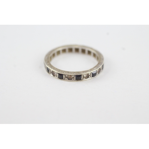 120 - 9ct gold blue & white gemstone full eternity ring (2.6g)