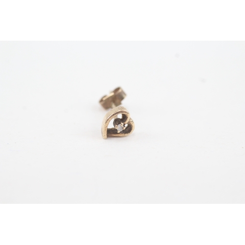 121 - 9ct gold diamond heart shaped stud earrings with scroll backs (1g)