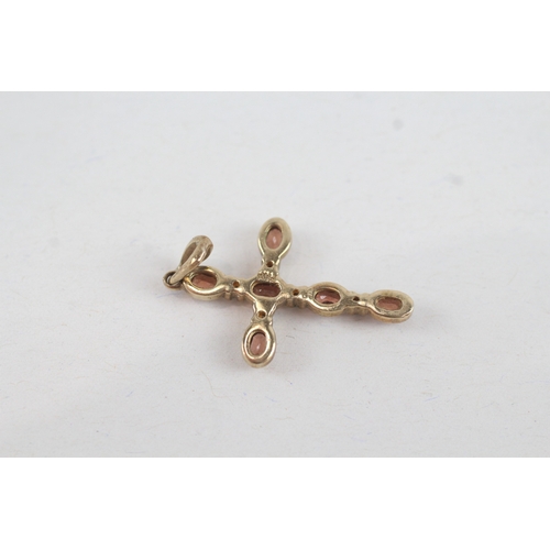 123 - 9ct gold garnet & diamond cross pendant (1.3g)