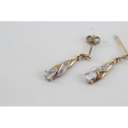 129 - 9ct gold aquamarine & diamond drop earrings with scroll backs (1g)
