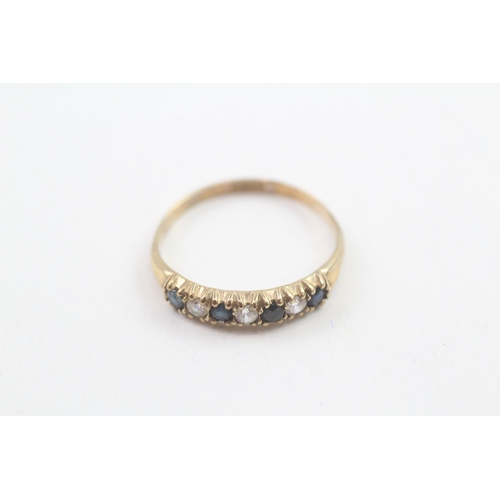 135 - 9ct gold cubic zirconia two row ring (1.5g)
