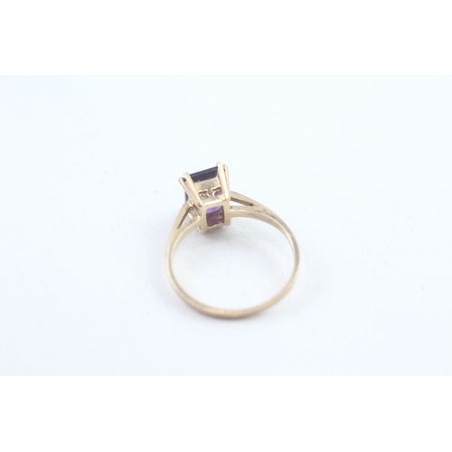137 - 9ct gold emerald cut amethyst dress ring, claw set (1.2g)