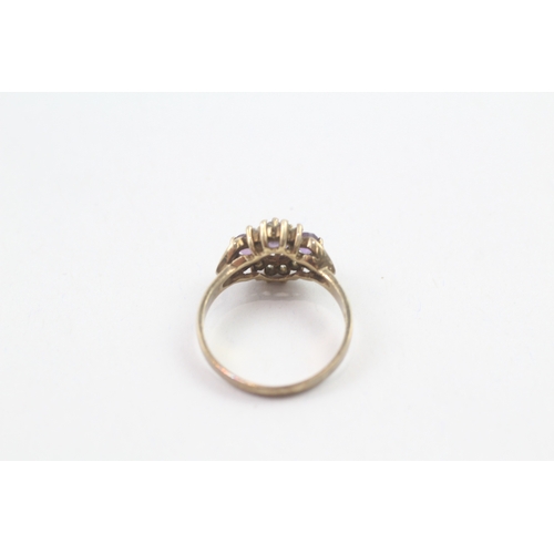 154 - 9ct gold amethyst & cubic zirconia dress ring, claw set (2.4g)