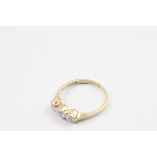 165 - 9ct gold diamond three stone ring (1.3g)
