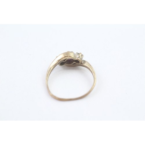 177 - 9ct gold blue topaz & amethyst three stone ring (1.9g)