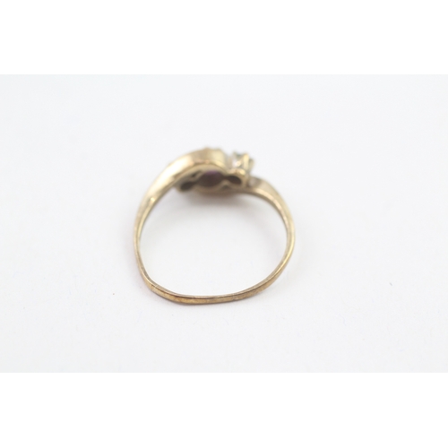 177 - 9ct gold blue topaz & amethyst three stone ring (1.9g)
