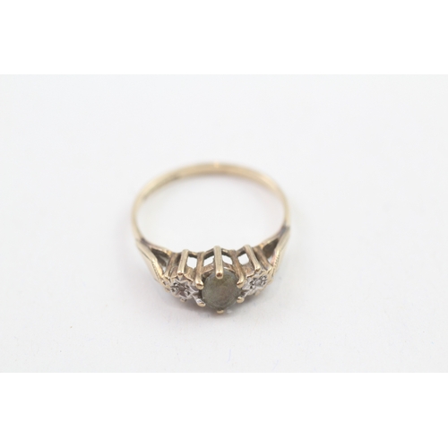 179 - 9ct gold blue topaz & diamond three stone ring (1.6g)