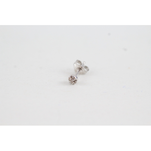 182 - 2 x 9ct gold diamond set solitaire stud earrings (0.8g)