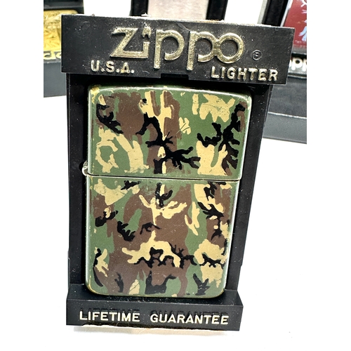 429 - 4 boxed vintage Zippo lighters