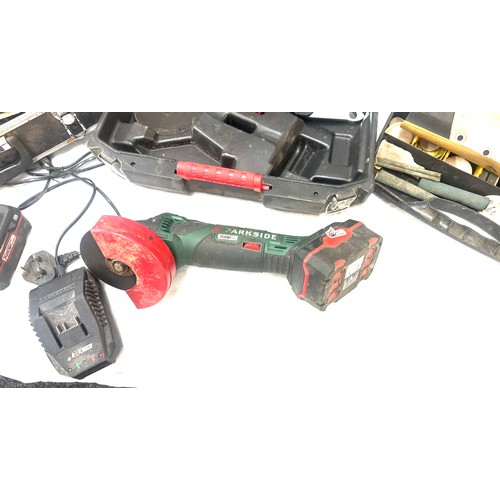 103 - Parkside 4 inch cordless angle grinder with battery and case, untested and a selection of accessorie... 