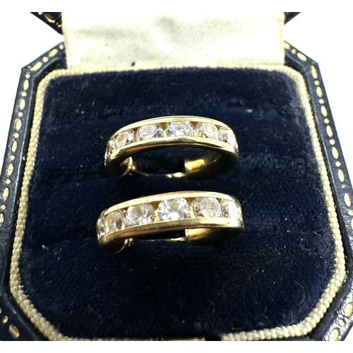 108 - 9ct gold white gemstone set earrings weight 2.8g
