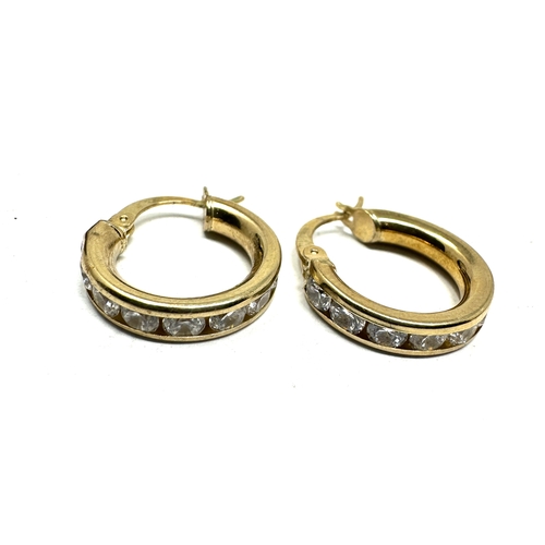 108 - 9ct gold white gemstone set earrings weight 2.8g