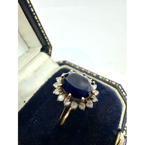 114 - 14ct gold blue & white gemstone ring weight 3.8g