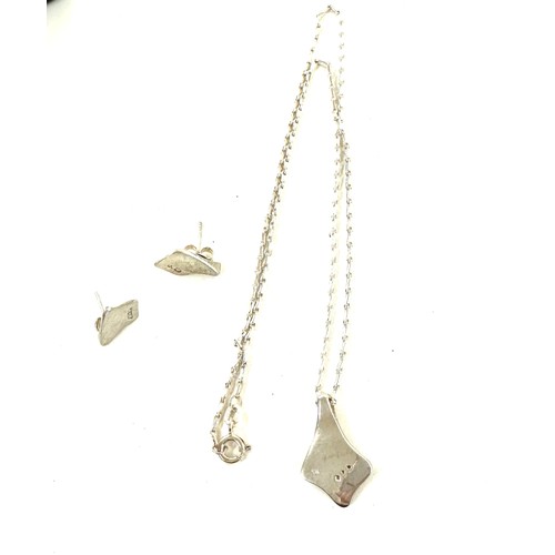 117 - Silver modernist necklace and earring set, set with diamond chips