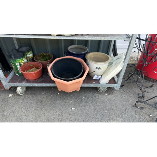 38 - Large selection of assorted plant pots largest measures approximately 11 inches tall by 17 deep