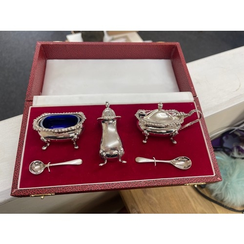 535 - Cased silver cruet set, hallmarked