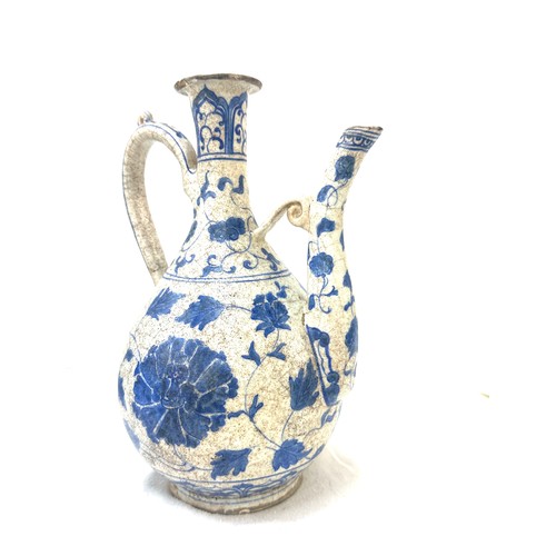 566 - Oriental blue and white tea pot overall height 10 inches