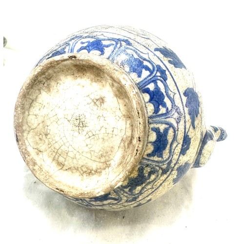 566 - Oriental blue and white tea pot overall height 10 inches