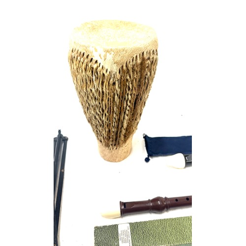 66 - Selection of musical instruments to include an African drum, Dolmetsch Recorder etc