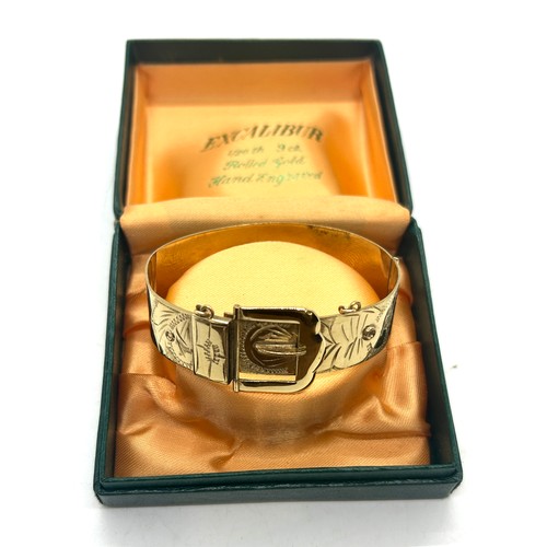 517 - 9ct rolled gold hand made bangle