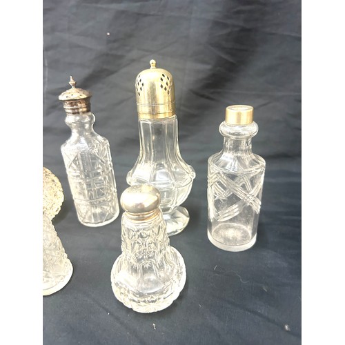 88 - Six glass bottles with silver and silver plate tops tallest measures approx 6.5 inches