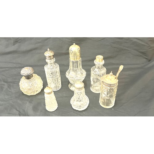 88 - Six glass bottles with silver and silver plate tops tallest measures approx 6.5 inches