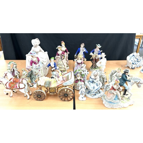 113 - Large selection of vintage porcelain lady and gent figures and a musical carriage figure  tallest me... 