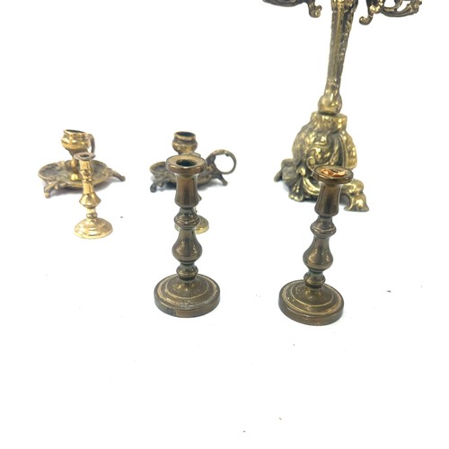 53 - Selection of vintage brass candle sticks tallest measures approx 14 inches tall