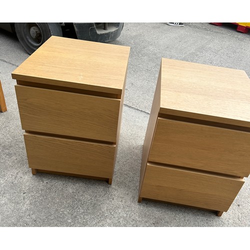 394 - Pair of two drawer oak bed side table measures approx 22 inches tall, 16 wide and 19 deep