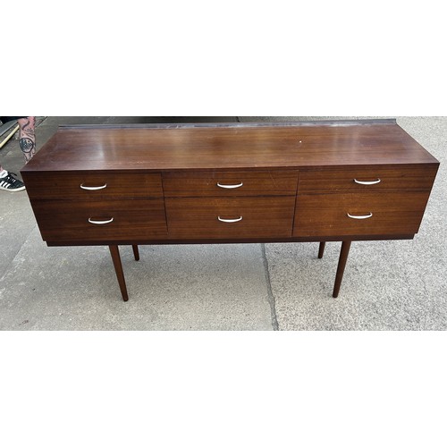 395 - Stag 6 drawer dressing table/side board with mirror measures approx 28 inches tall, 59 wide and 18 d... 