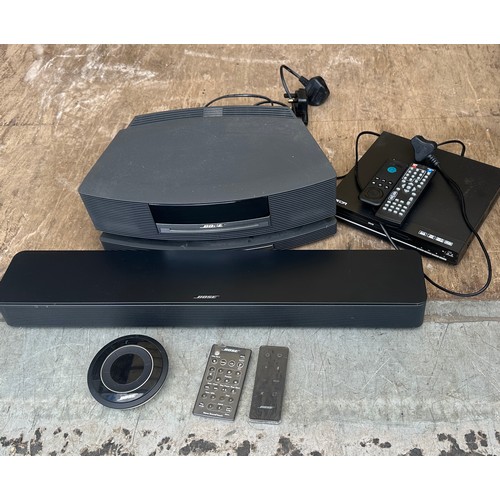 387 - Bose sound system with remotes and a dvd player in working order