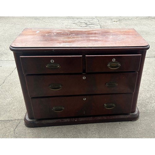 375 - Two over two mahogany chest of drawers measures approx 30 inches tall, 42 wide and 20 deep