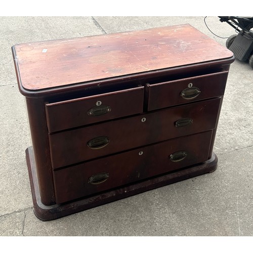 375 - Two over two mahogany chest of drawers measures approx 30 inches tall, 42 wide and 20 deep