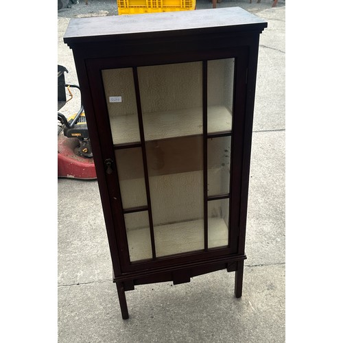 382 - Glass fronted cabinet measures approx 50 inches tall, 23 wide and 11 deep