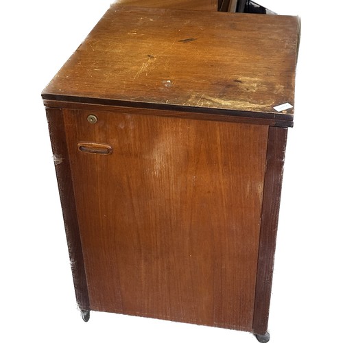 381 - Teak sewing cupboard measures approximately Height 29 inches, by 21 inches