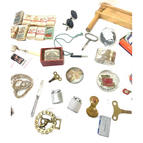 98 - Large selection of collectables includes lighters, money boxes, pens etc