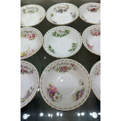 299 - Set 12 Royal Albert flowers of the month bowls (8 of which are second quality), all in good overall ... 