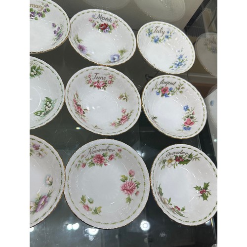 299 - Set 12 Royal Albert flowers of the month bowls (8 of which are second quality), all in good overall ... 