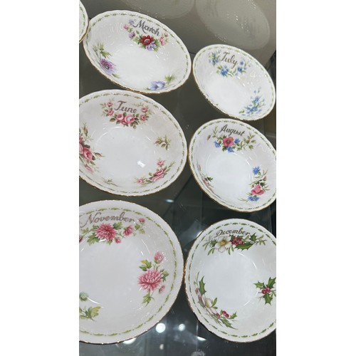 299 - Set 12 Royal Albert flowers of the month bowls (8 of which are second quality), all in good overall ... 