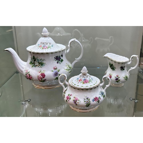 297 - Royal Albert Flower Of The Month Teapot, cream and sugar set, all Second quality, good overall condi... 