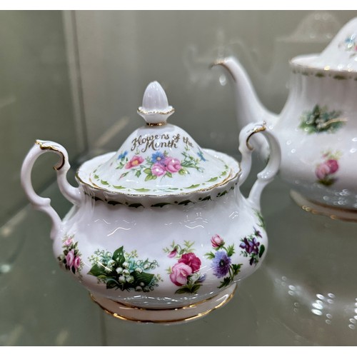 298 - Royal Albert Flower Of The Month Teapot, 2  Sugar lidded jats, all of second quality, all in good ov... 