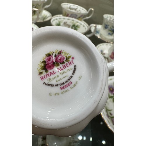 300 - Set 12 Royal Albert flowers of the month cups and saucers, all second quality, all apart from the Oc... 