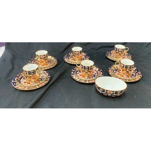 562 - Part Royal Crown Derby 2451 coffee set includes 6 cups, 6 saucers, 6 plates and a sugar bowl