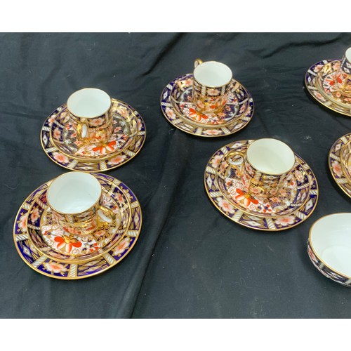 562 - Part Royal Crown Derby 2451 coffee set includes 6 cups, 6 saucers, 6 plates and a sugar bowl