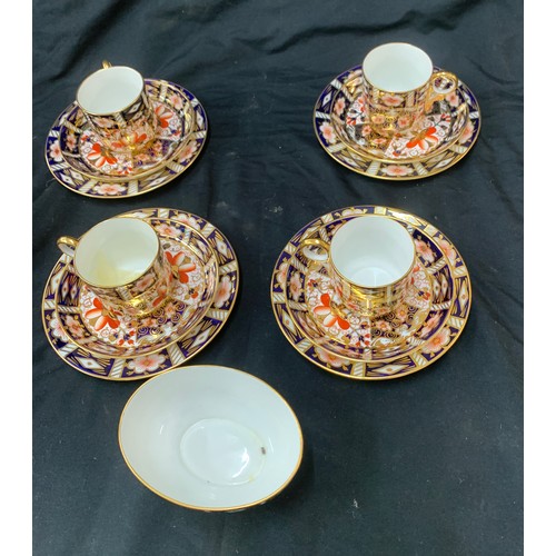 562 - Part Royal Crown Derby 2451 coffee set includes 6 cups, 6 saucers, 6 plates and a sugar bowl