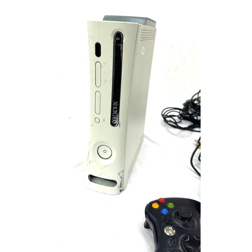 104 - XBOX 360 gaming console with control, leads, adapters, one jammed re set button and no power lead.